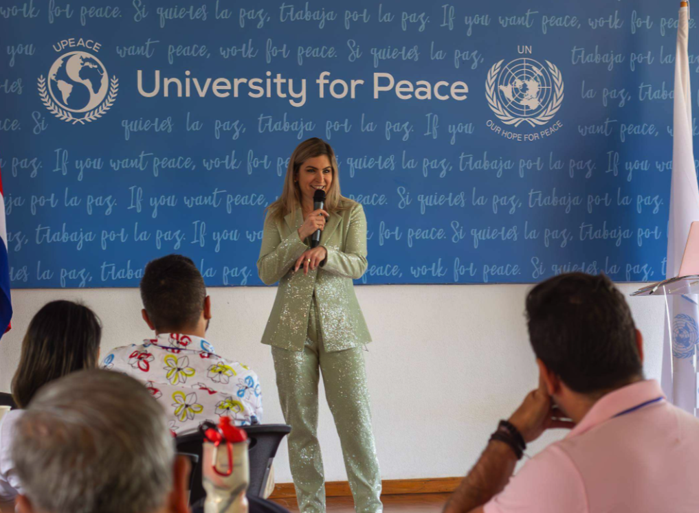 A speaker connecting with the audience at the University for Peace